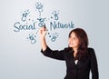 Woman draving social network theme on whiteboard Royalty Free Stock Photo