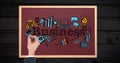 Woman drawing business icons on board Royalty Free Stock Photo