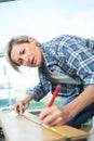 Woman drawing wood board