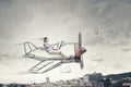 Woman in drawn airplane