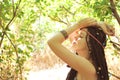 Woman with dreads hairstyle profile portrait