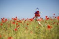 Woman at dress drowns in poppy field