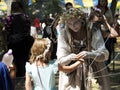 Woman dressed as fairy interacting with a young girl at the Bristol Renaissance Faire Royalty Free Stock Photo