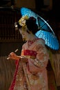 Woman dressed as a traditional Japanese geisha in Kyoto, Japan