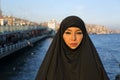Woman dressed with black headscarf, chador on istanbul street, turkey Royalty Free Stock Photo