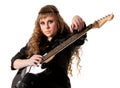 Woman squatting and clutching guitar Royalty Free Stock Photo