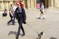 Woman Walking Small Dog 