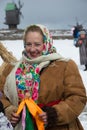 Woman dressed in holiday traditional Ukrainian winter clothes