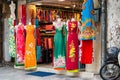 Woman dresses store at the street in Hanoi old French quarters.