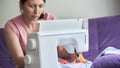 Woman dressmaker working sewing machine. the process of creating clothes at home Royalty Free Stock Photo