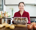Woman with dried mushrooms Royalty Free Stock Photo