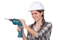 Woman with a drill Royalty Free Stock Photo