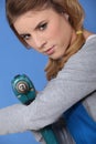 Woman with a drill Royalty Free Stock Photo
