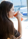 Woman drink coffee in airport