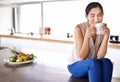 Woman, drink and smell coffee in kitchen or morning, enjoying and holding mug or cup. Female person, relaxing and tea or Royalty Free Stock Photo