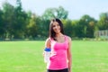 Woman drink water bottle sport on stadium Royalty Free Stock Photo