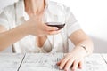 Woman drinking alcohol on white background. Focus on wine glass Royalty Free Stock Photo