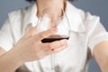 Woman drinking alcohol on white background. Focus on wine glass Royalty Free Stock Photo