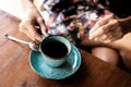 Woman drinking balinese coffee bali kopi. Bali island.