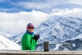 Woman drinking and camping in mountains Royalty Free Stock Photo