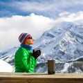 Woman drinking camping in mountains Royalty Free Stock Photo