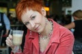 Woman drinking coffee in cafe