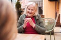 Woman drinking coffee at the cafe Royalty Free Stock Photo