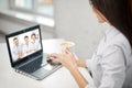 Woman drinking coffee and having video conference Royalty Free Stock Photo