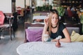 Woman drinking coffee in the morning at restaurant soft focus. pretty girl with cup of cappuccino. lady enjoy Royalty Free Stock Photo