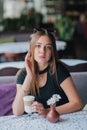 Woman drinking coffee in the morning at restaurant soft focus. Smiling pretty girl with cup of cappuccino. lady enjoy Royalty Free Stock Photo