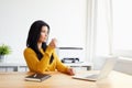 Woman drinking coffee in the office Royalty Free Stock Photo