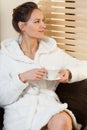 Woman drinking coffee in spa Royalty Free Stock Photo