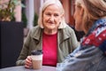 Woman drinking coffee at the street cafe Royalty Free Stock Photo