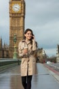 Woman Drinking Coffee Talking on Cell Phone, Big Ben, London Royalty Free Stock Photo