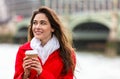 Woman Drinking Coffee, Westminster Bridge, London, England Royalty Free Stock Photo