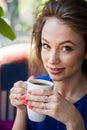 Woman drinking a cup of coffee