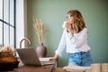 Woman drinking her coffee in the kitchen at the morning Royalty Free Stock Photo