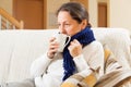 Woman drinking hot tea Royalty Free Stock Photo