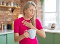 Woman drinking hot tea