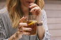 Woman drinking iced tea with a straw