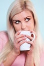 Woman drinking a mug of tea Royalty Free Stock Photo