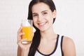 Woman drinking orange juice Beautiful mixed-race Asian, Caucasian model. Royalty Free Stock Photo