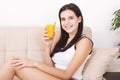 Woman drinking orange juice Beautiful mixed-race Asian, Caucasian model. Royalty Free Stock Photo