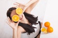 Woman drinking orange juice Beautiful mixed-race Asian, Caucasian model. Royalty Free Stock Photo