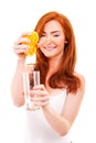 Woman drinking orange juice smiling