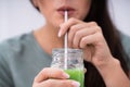 Woman Drinking Organic Smoothie