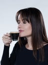 Woman drinking smelling coffee Royalty Free Stock Photo
