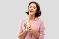 Woman drinking soda from can with paper straw Royalty Free Stock Photo