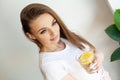 Woman Drinking Summer Refreshing Fruit Flavored Infused Water With Fresh Organic Lemon Royalty Free Stock Photo