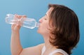 Woman drinking water from a bottle Royalty Free Stock Photo
